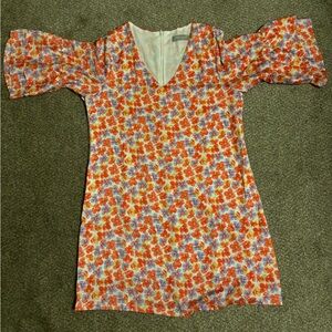 Ladies Dress, multi-colored with 3/4 ruffly sleeves.  Built in slip, size Medium